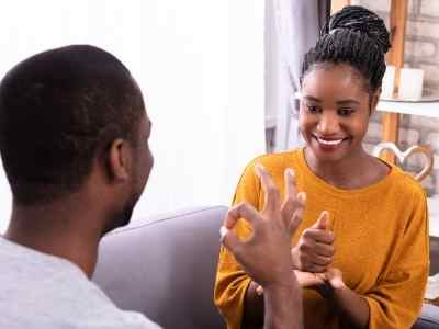 2-people-using-sign-language-to-communicate