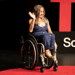 Alycia Anderson on stage at TedX Talk
