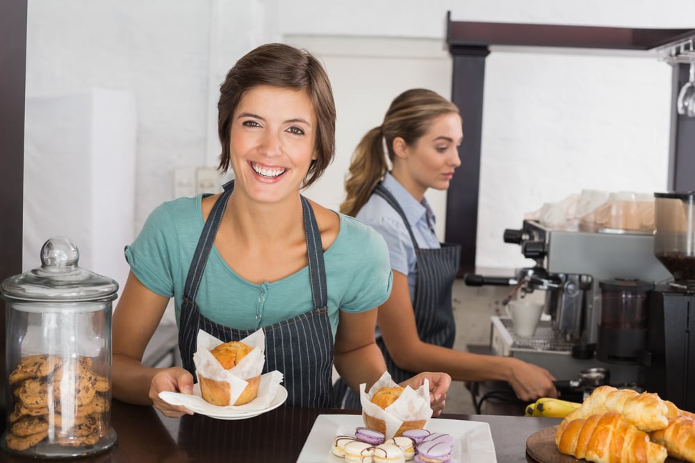 Pretty waitresses working with a smile at the coffee shop Pretty waitresses working with a smile at the coffee shop